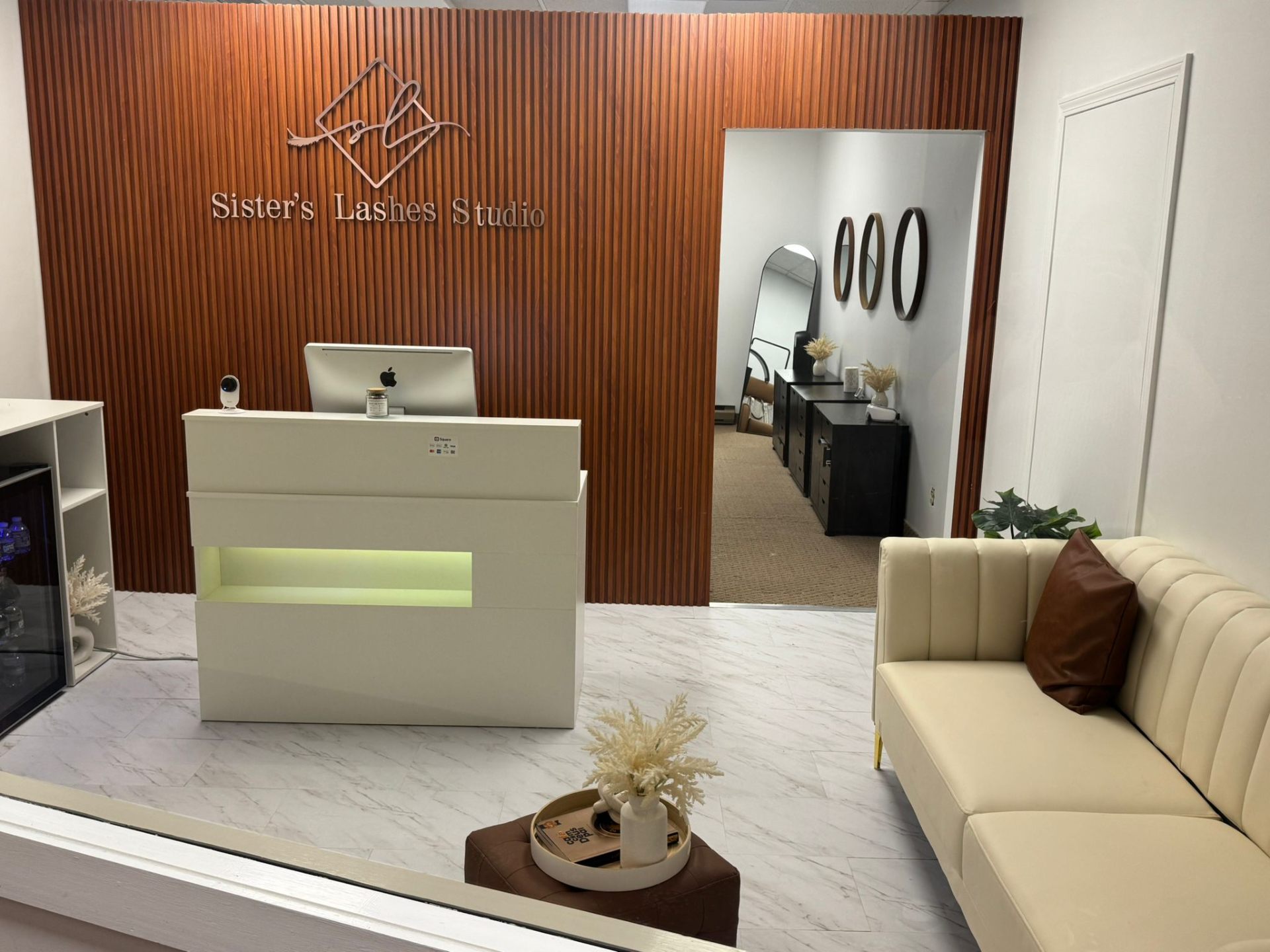 Inside Sister's Lashes Studio — reception area